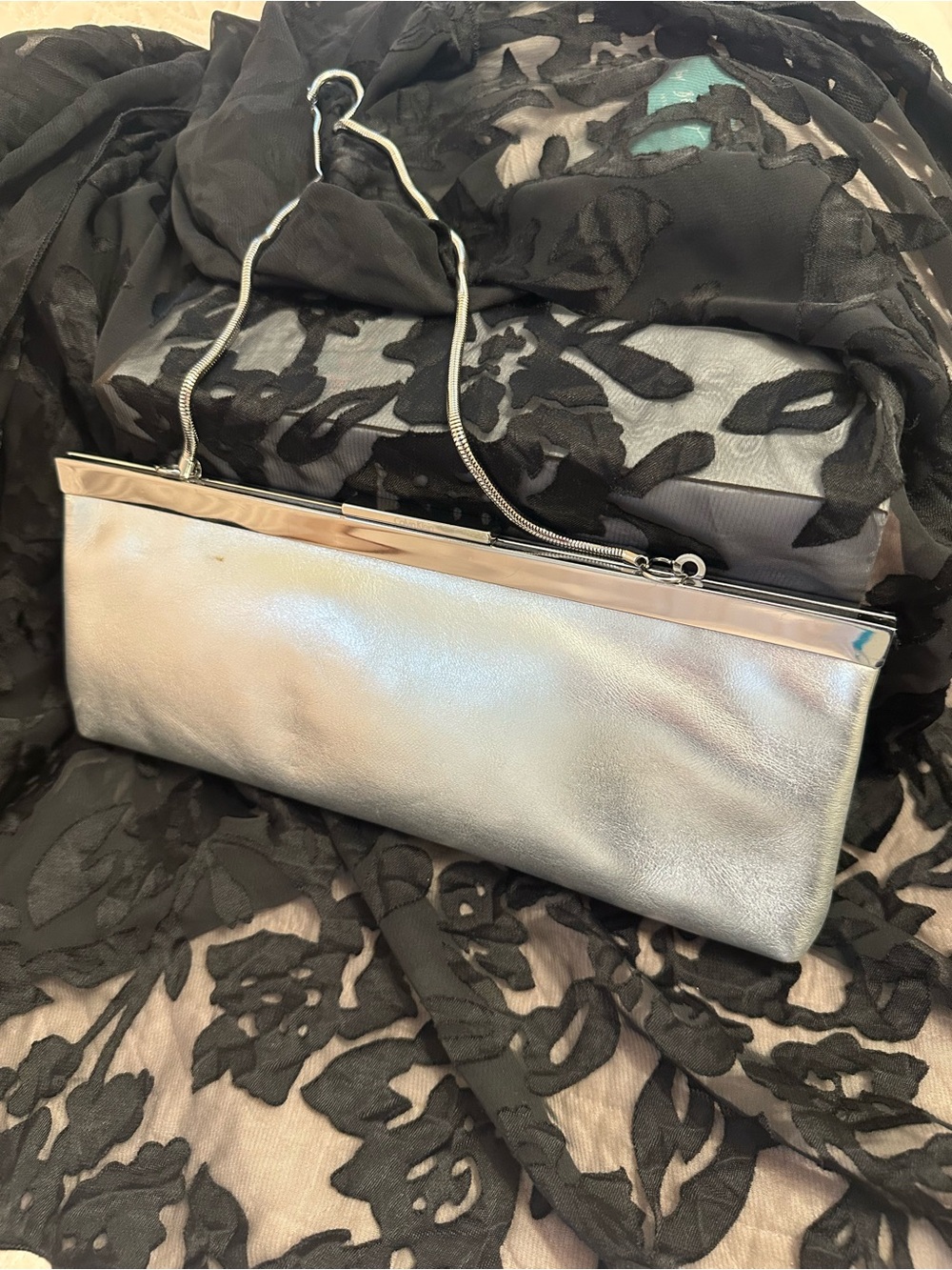 Calvin Klein Silver leather evening bag.